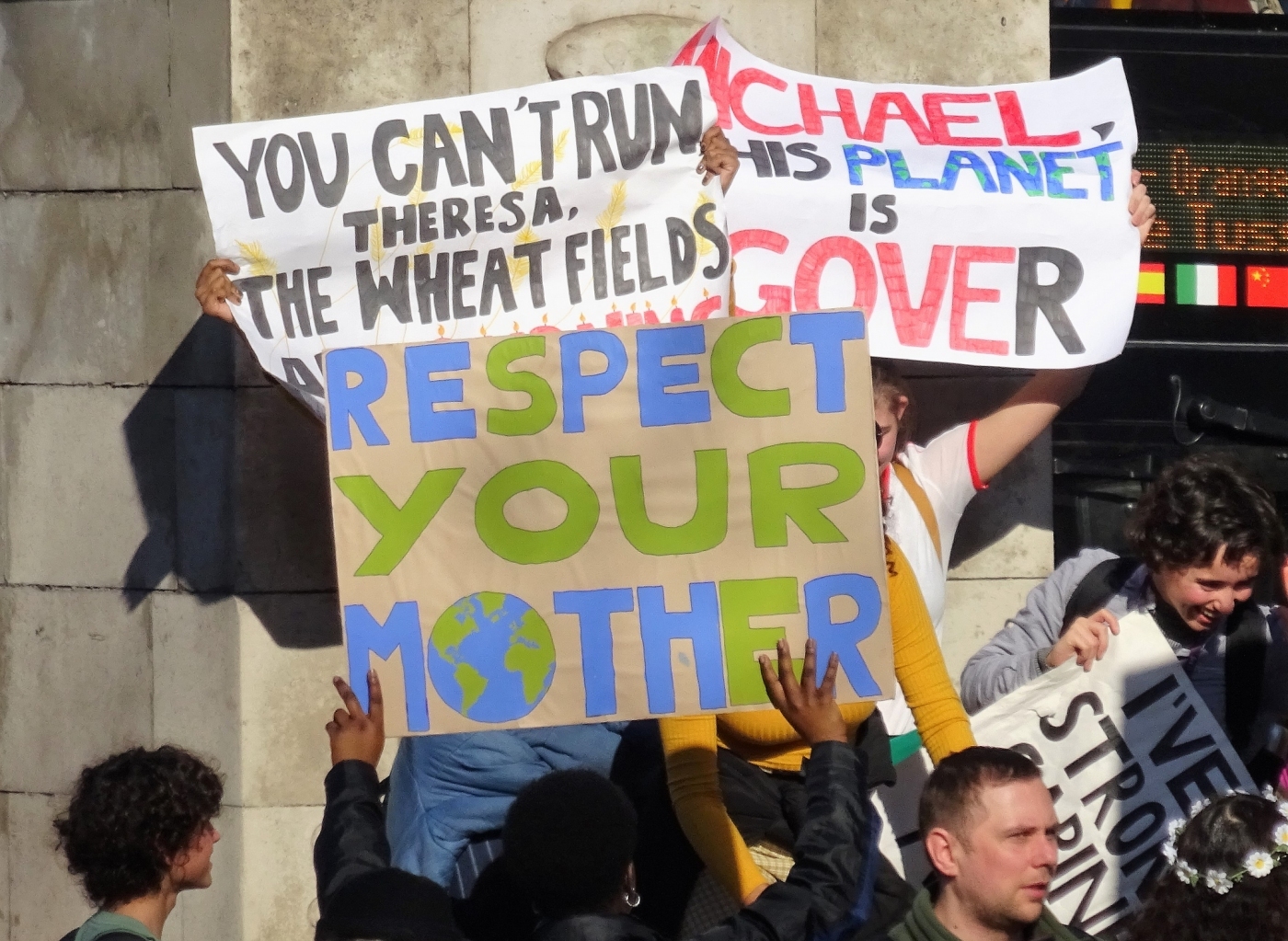 Placard from school strike for climate reads "Respect your mother"